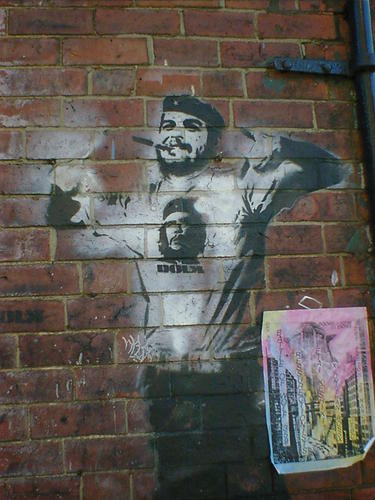 Stencil art of a bearded man in a beret, wearing a Ch&eacute; Guevara t-shirt