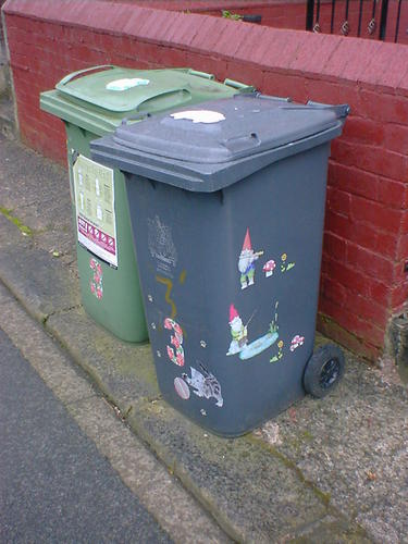 Gnome stickers decorating a wheelie bin