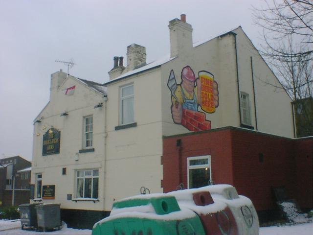 Exterior view of Bricklayers Arms pub.