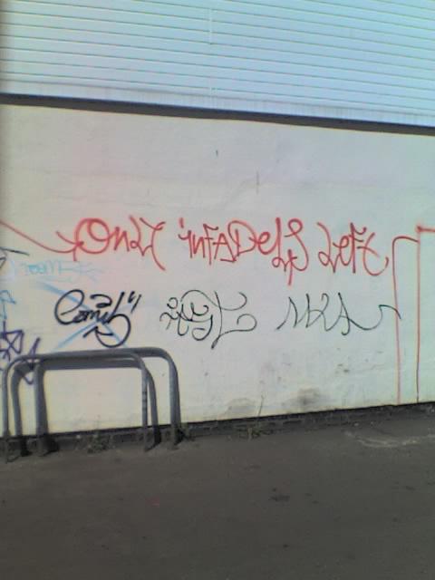 Grafitti reads: Only Infadels Left
