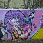 Cartoon girl graffiti with bloody cleaver, kitchen knife, and innocent smile