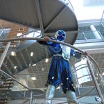 Andrew in a blue and silver spacesuit