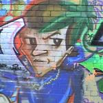 Graffiti art - a young man with a sharp haircut