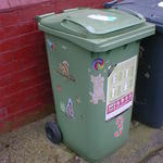 Cute animal stickers on a wheelie bin